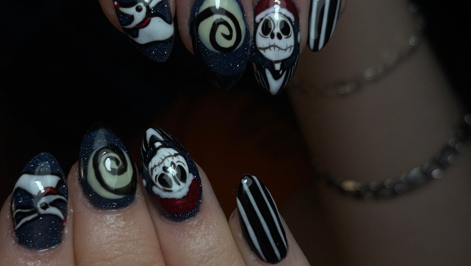 Hand-painted character nail art on a glitter navy set — AF Beauty, Clonmel